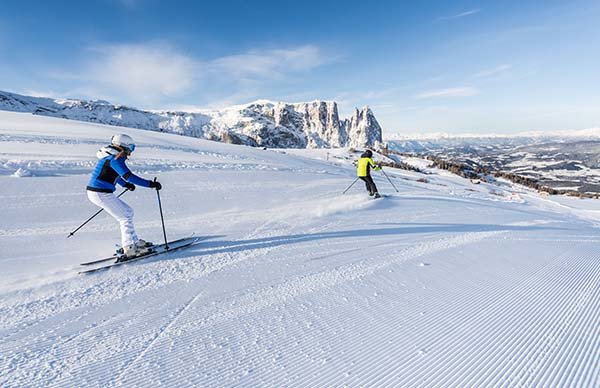Skiing in the Carezza ski resort or on the Seiser Alm